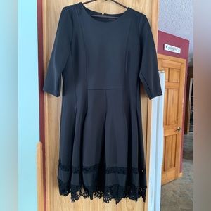 Black mid length with 3/4 sleeve and lace trim dress